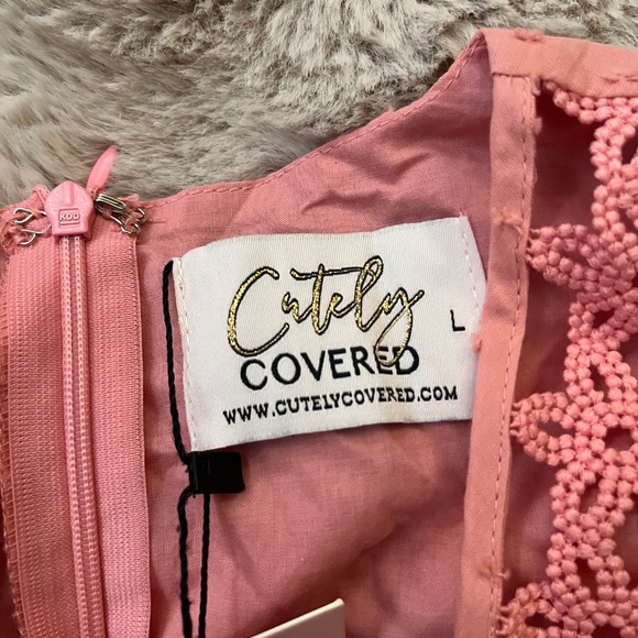 Pink dress peek a boo holes - Picture 3 of 3